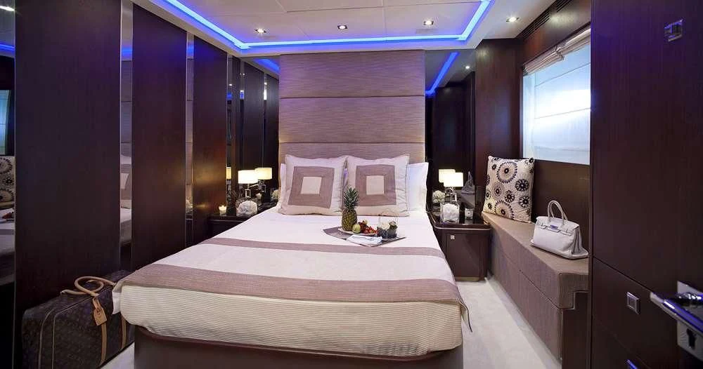a bed in a room aboard MY TOY Yacht for Sale
