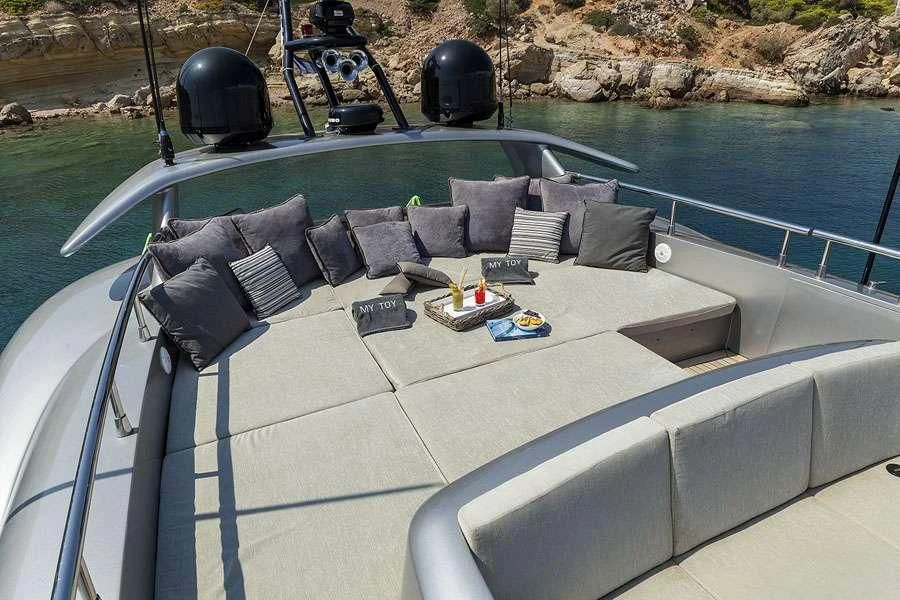 a boat with a seat on the deck aboard MY TOY Yacht for Sale