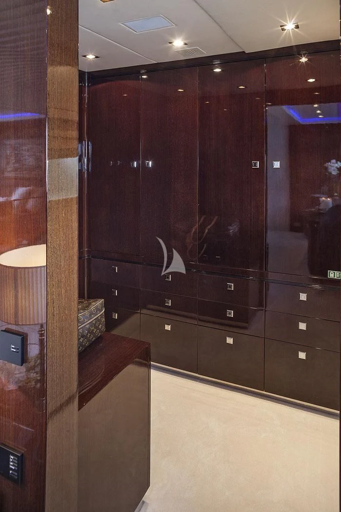 a bathroom with a large mirror aboard MY TOY Yacht for Sale
