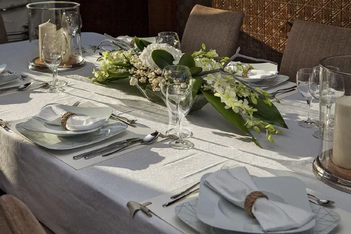 a table set with place settings aboard MY TOY Yacht for Sale