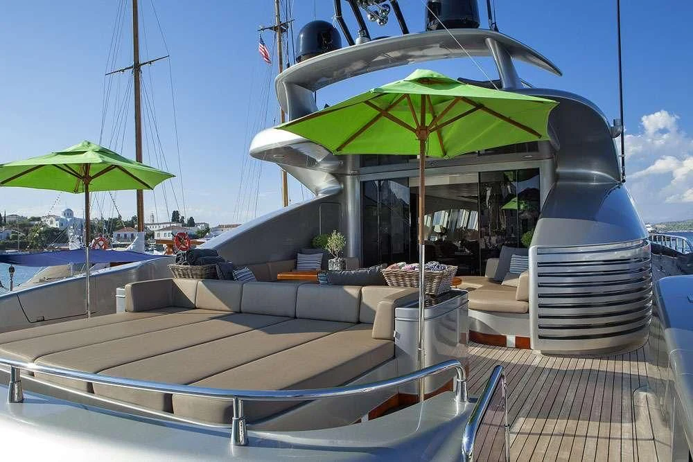 a pool with umbrellas aboard MY TOY Yacht for Sale