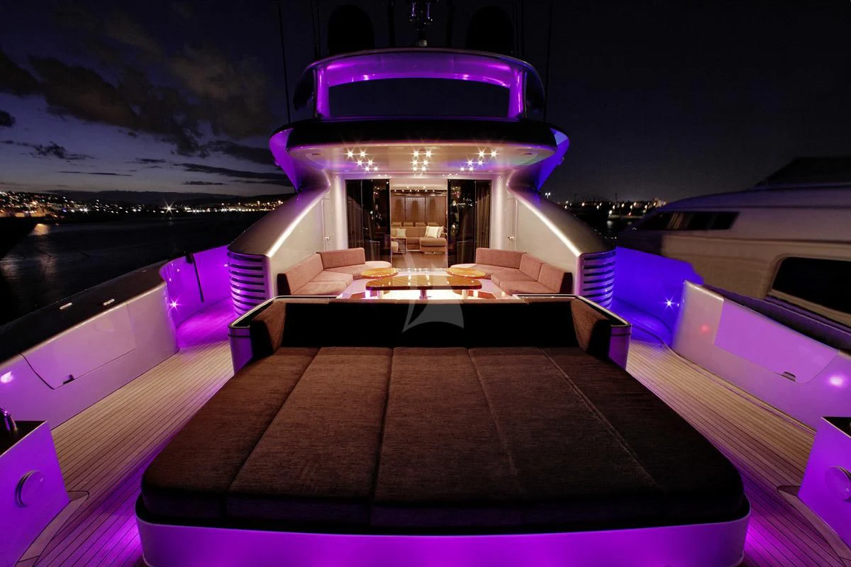 a room with a large statue aboard MY TOY Yacht for Sale