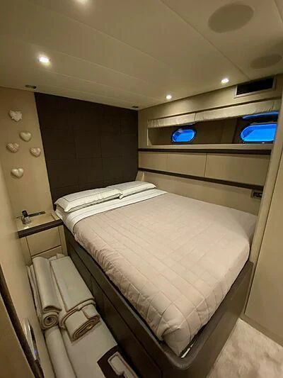 a small room with bunk beds aboard @LAST Yacht for Sale