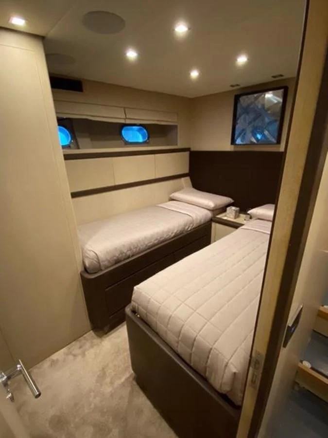 a room with two beds aboard @LAST Yacht for Sale