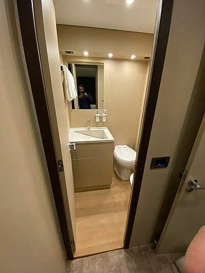 a bathroom with a sink and a toilet aboard @LAST Yacht for Sale