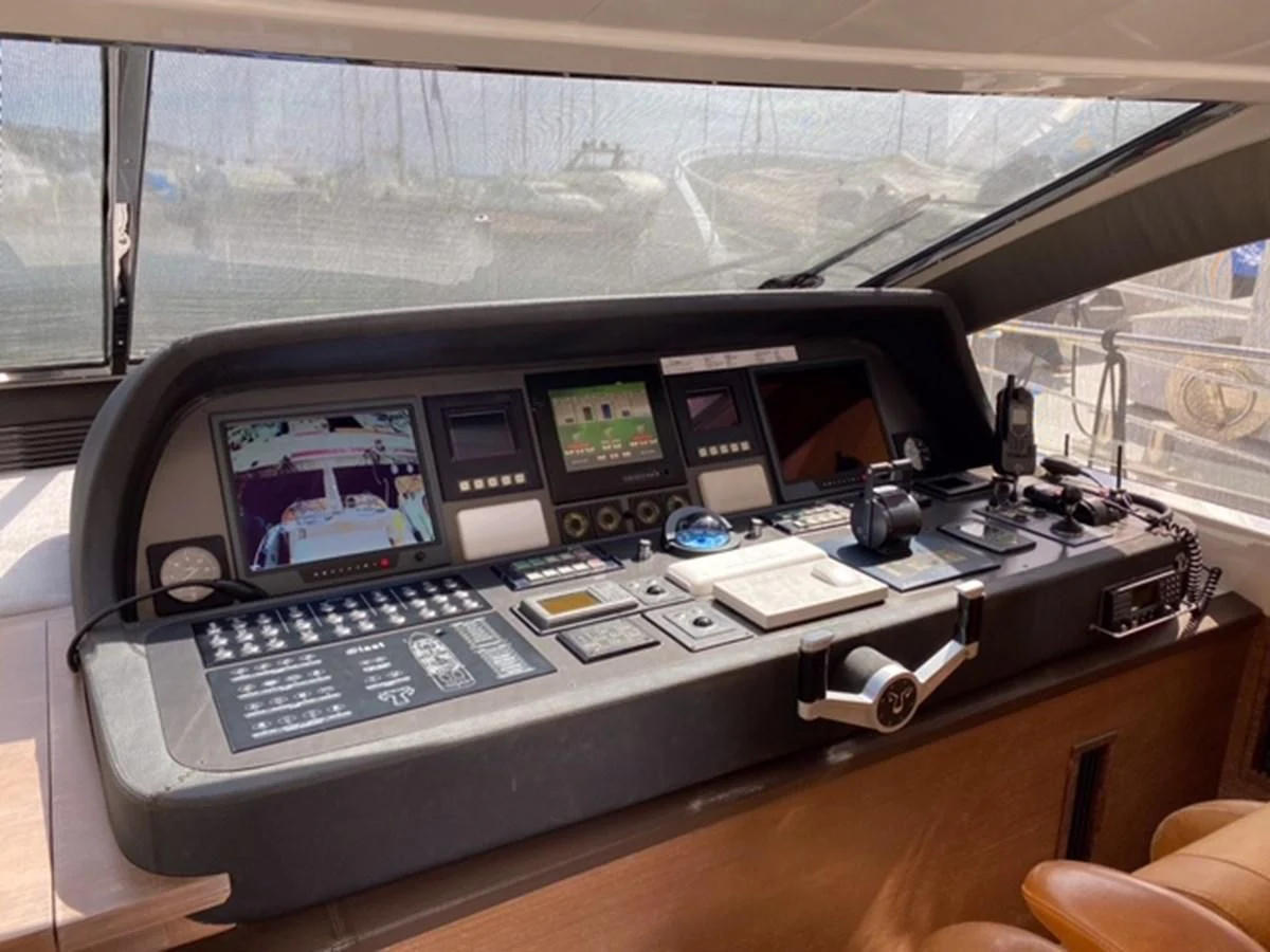 a console with many buttons and knobs on it aboard @LAST Yacht for Sale