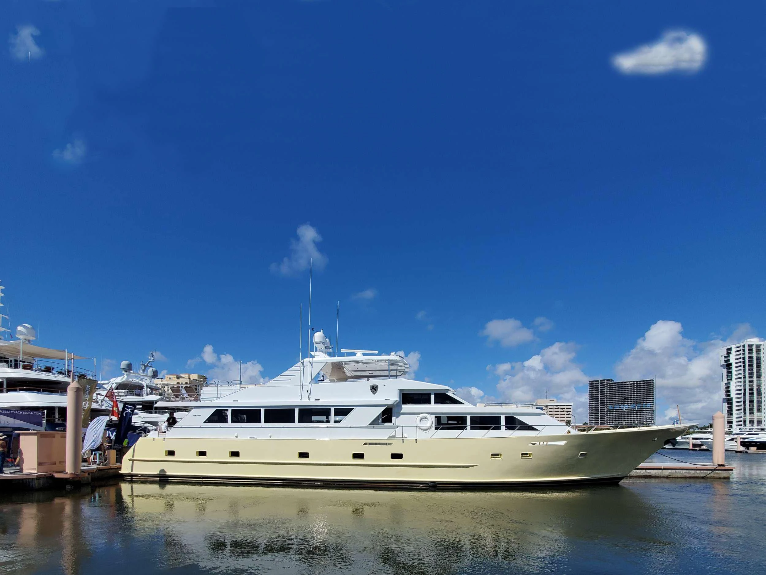 a white yacht in the water aboard A PLACE IN THE SUN Yacht for Sale