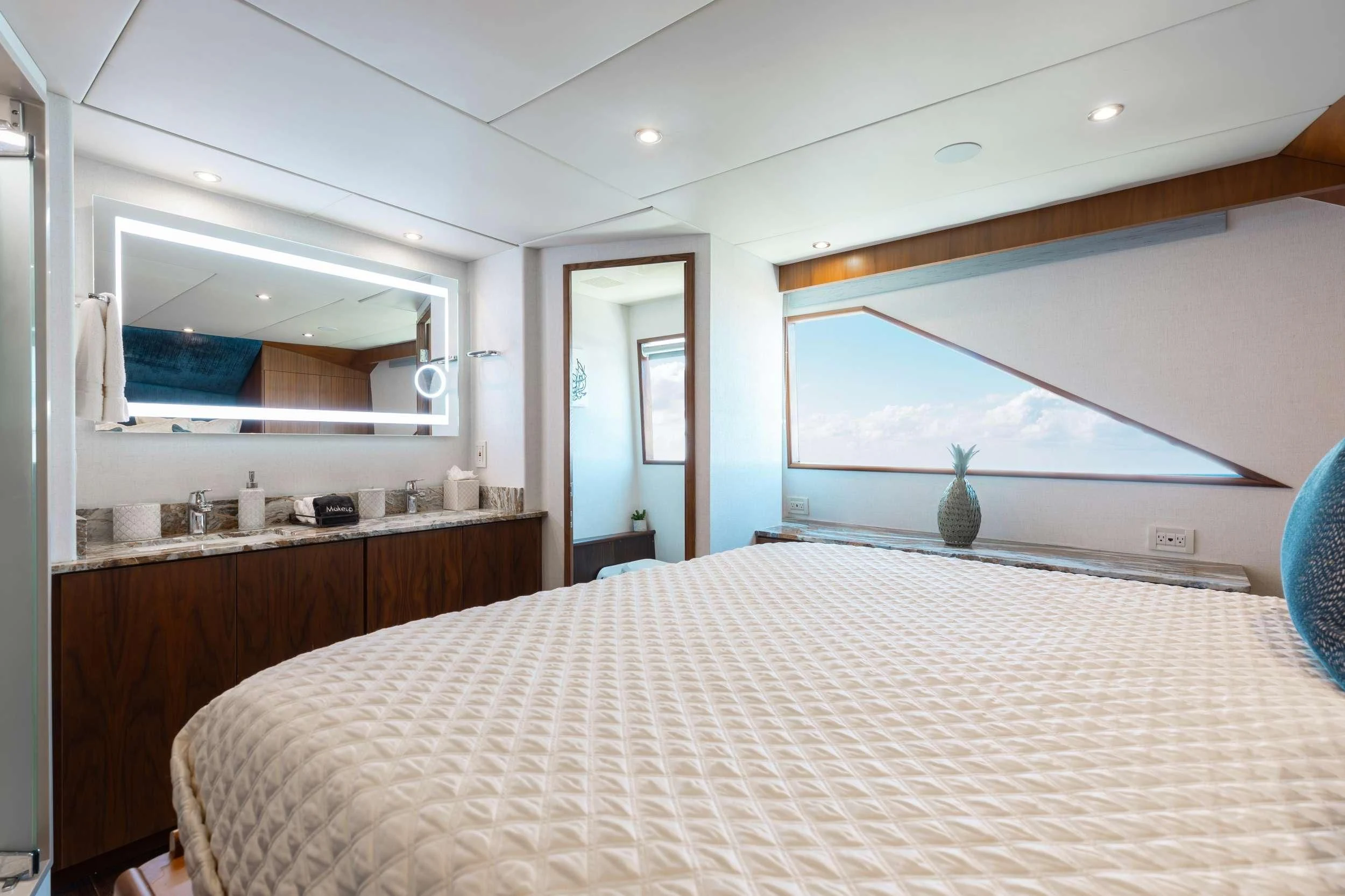a bedroom with a bed aboard A PLACE IN THE SUN Yacht for Sale