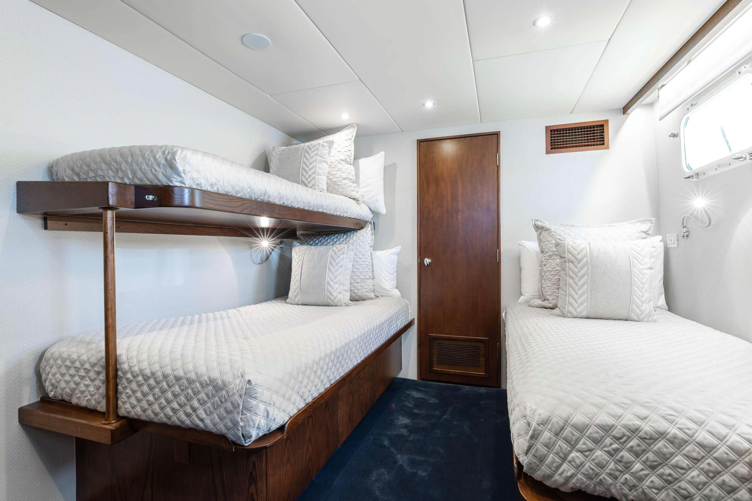 a couple of beds in a room aboard A PLACE IN THE SUN Yacht for Sale