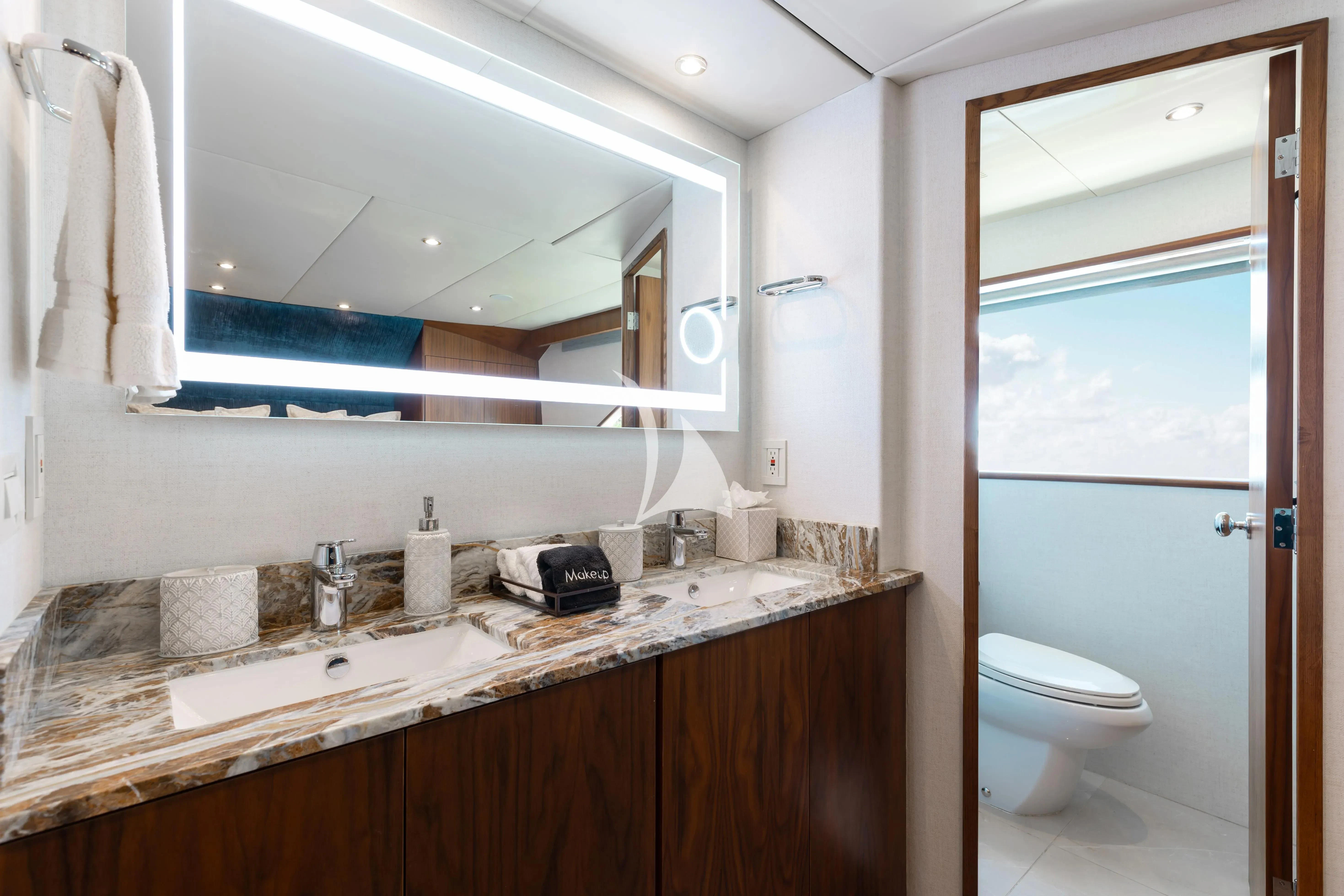 a bathroom with a sink and a toilet aboard A PLACE IN THE SUN Yacht for Sale