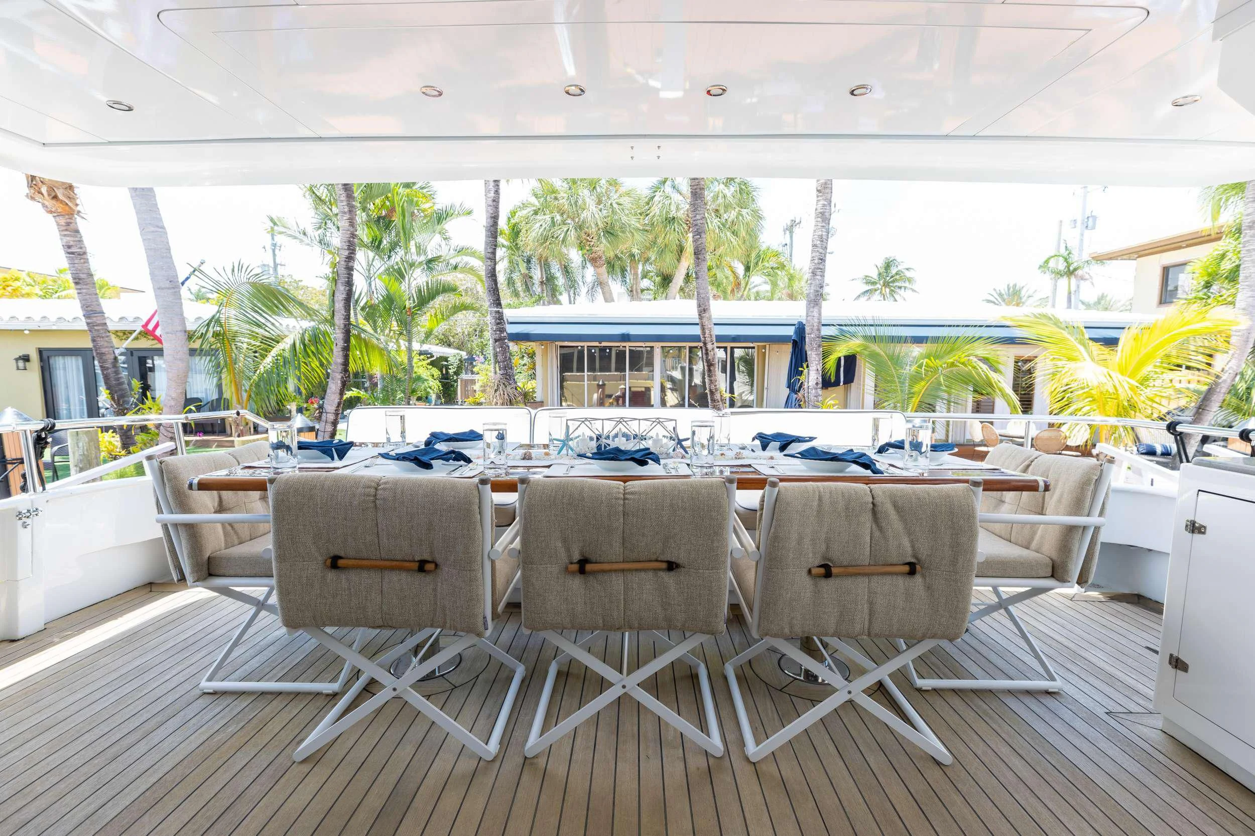 a table and chairs in a room aboard A PLACE IN THE SUN Yacht for Sale