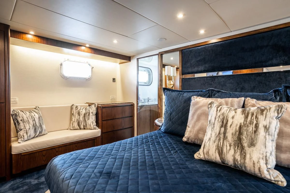 a bed with pillows aboard A PLACE IN THE SUN Yacht for Sale