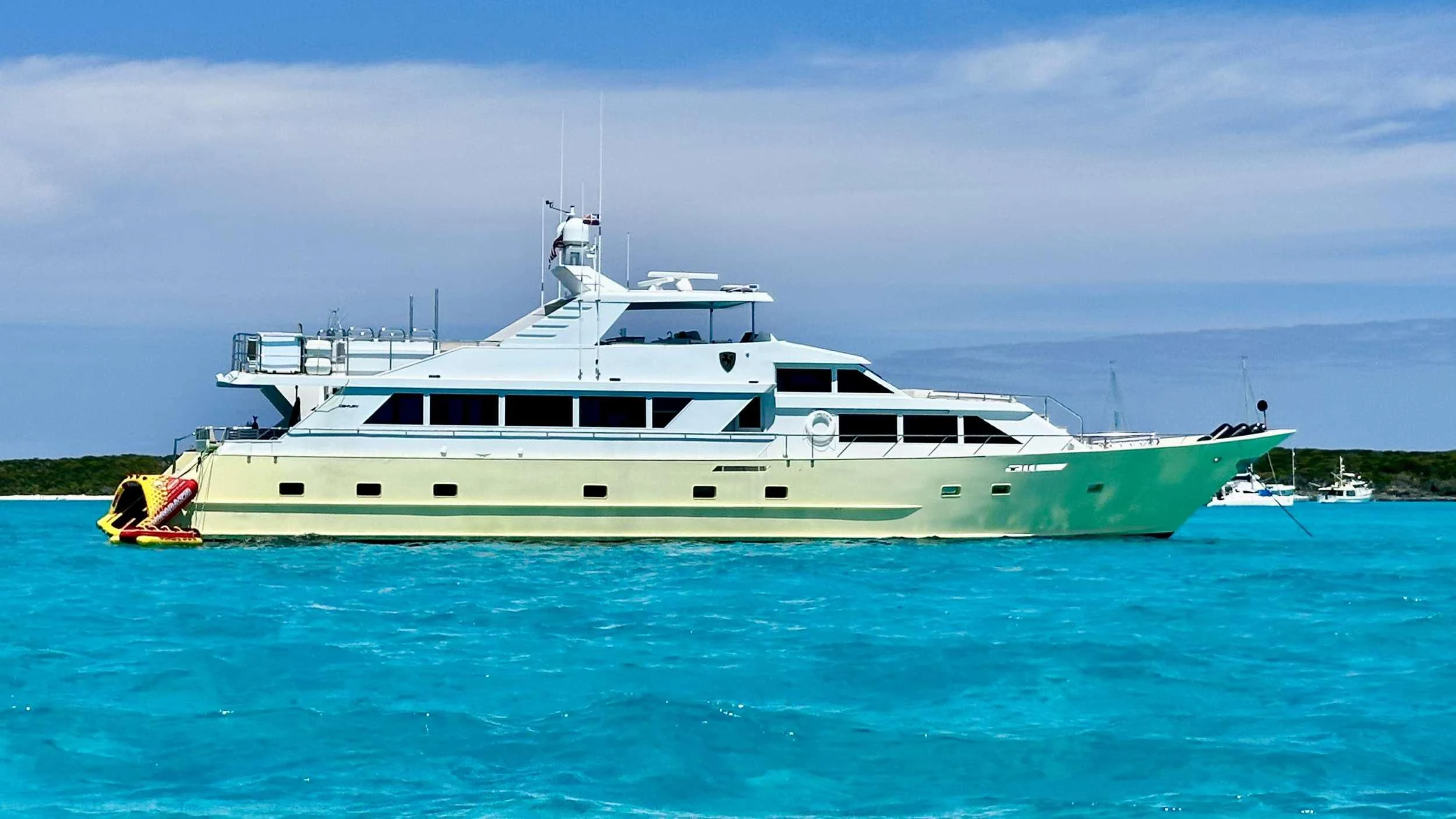 a large white boat in the water aboard A PLACE IN THE SUN Yacht for Sale