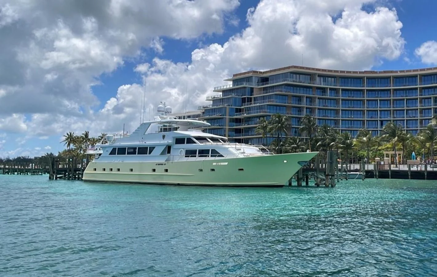 a white boat in the water aboard A PLACE IN THE SUN Yacht for Sale