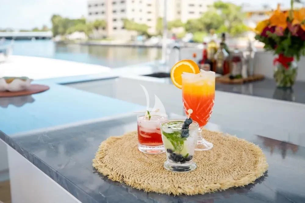 a group of drinks on a table aboard A PLACE IN THE SUN Yacht for Sale