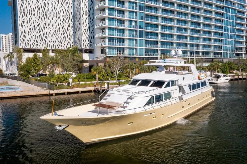 a boat docked in a city aboard A PLACE IN THE SUN Yacht for Sale