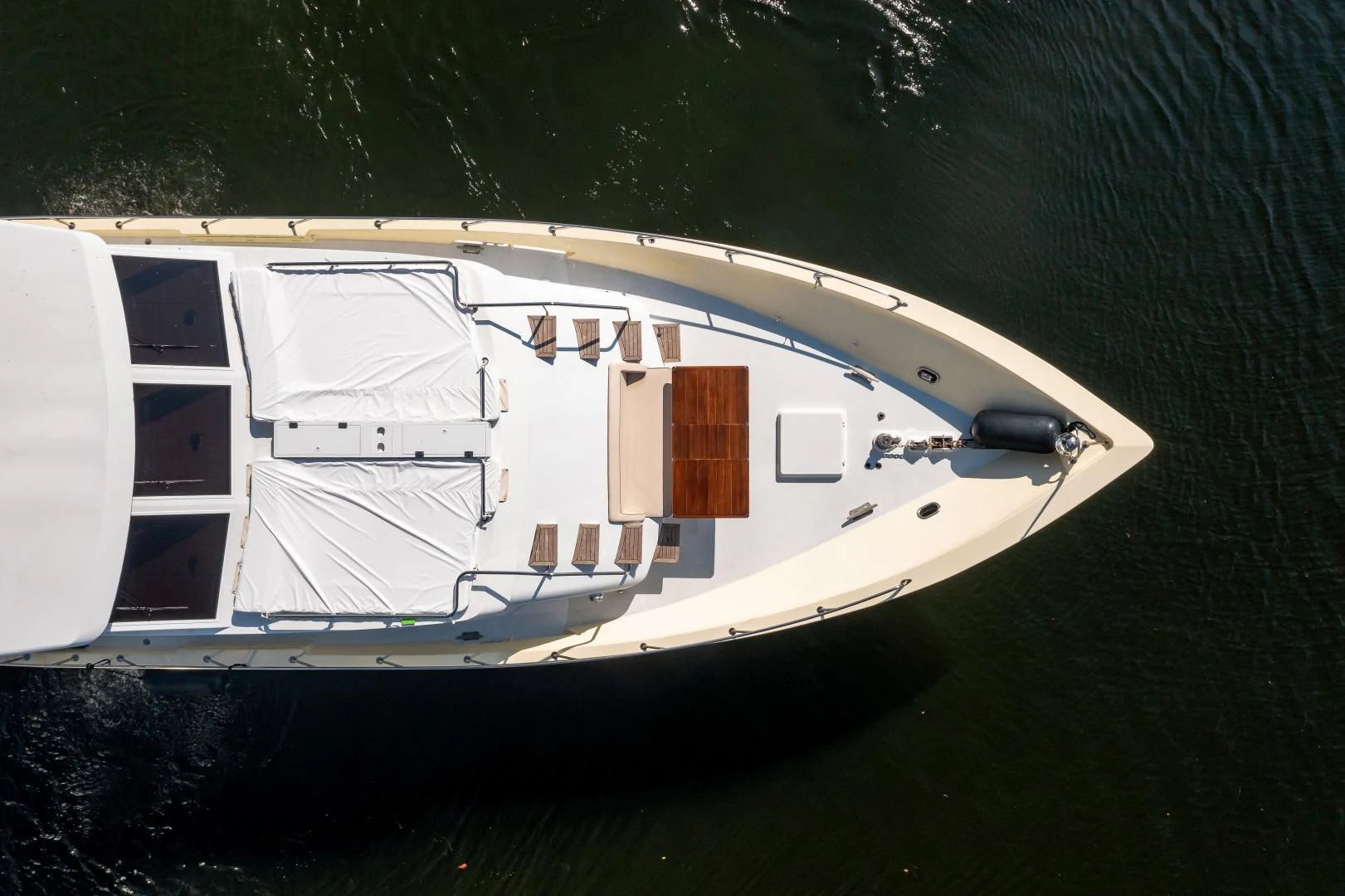 a white yacht in the water aboard A PLACE IN THE SUN Yacht for Sale