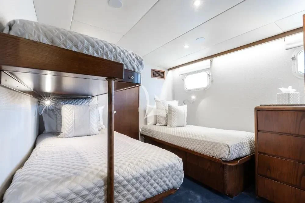 a couple of beds in a room aboard A PLACE IN THE SUN Yacht for Sale