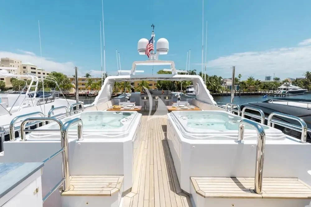 a boat dock with boats aboard A PLACE IN THE SUN Yacht for Sale