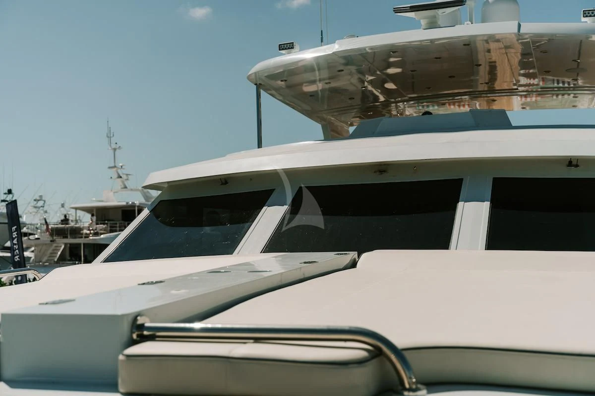 a boat with a satellite dish on the deck aboard A PLACE IN THE SUN Yacht for Sale