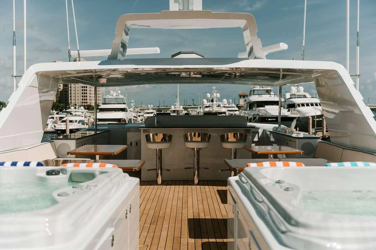 a large yacht in the water aboard A PLACE IN THE SUN Yacht for Sale