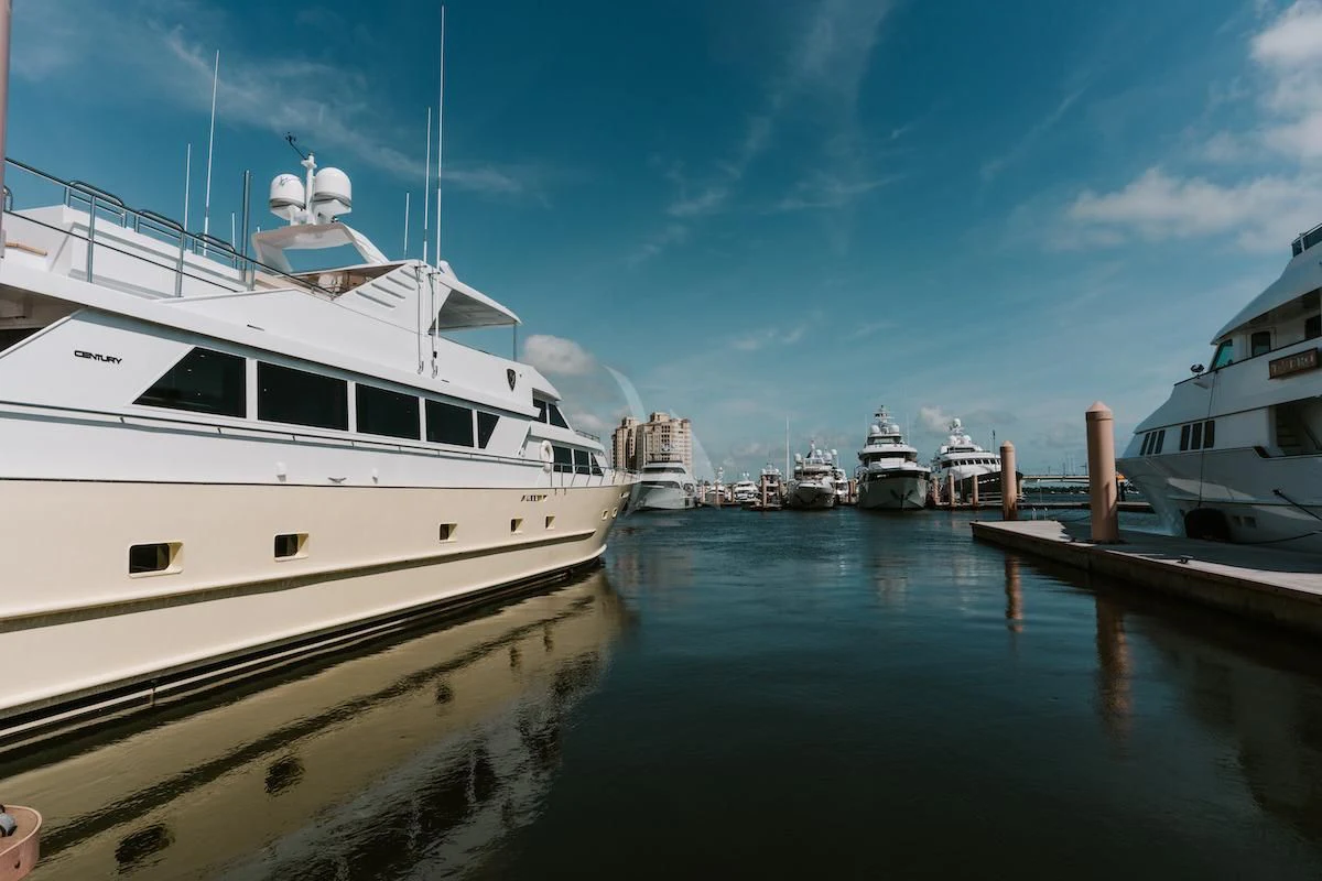 a group of boats are parked at a dock aboard A PLACE IN THE SUN Yacht for Sale