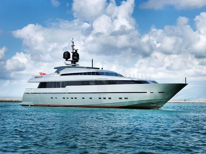 a large white ship in the water aboard NAIA Yacht for Sale