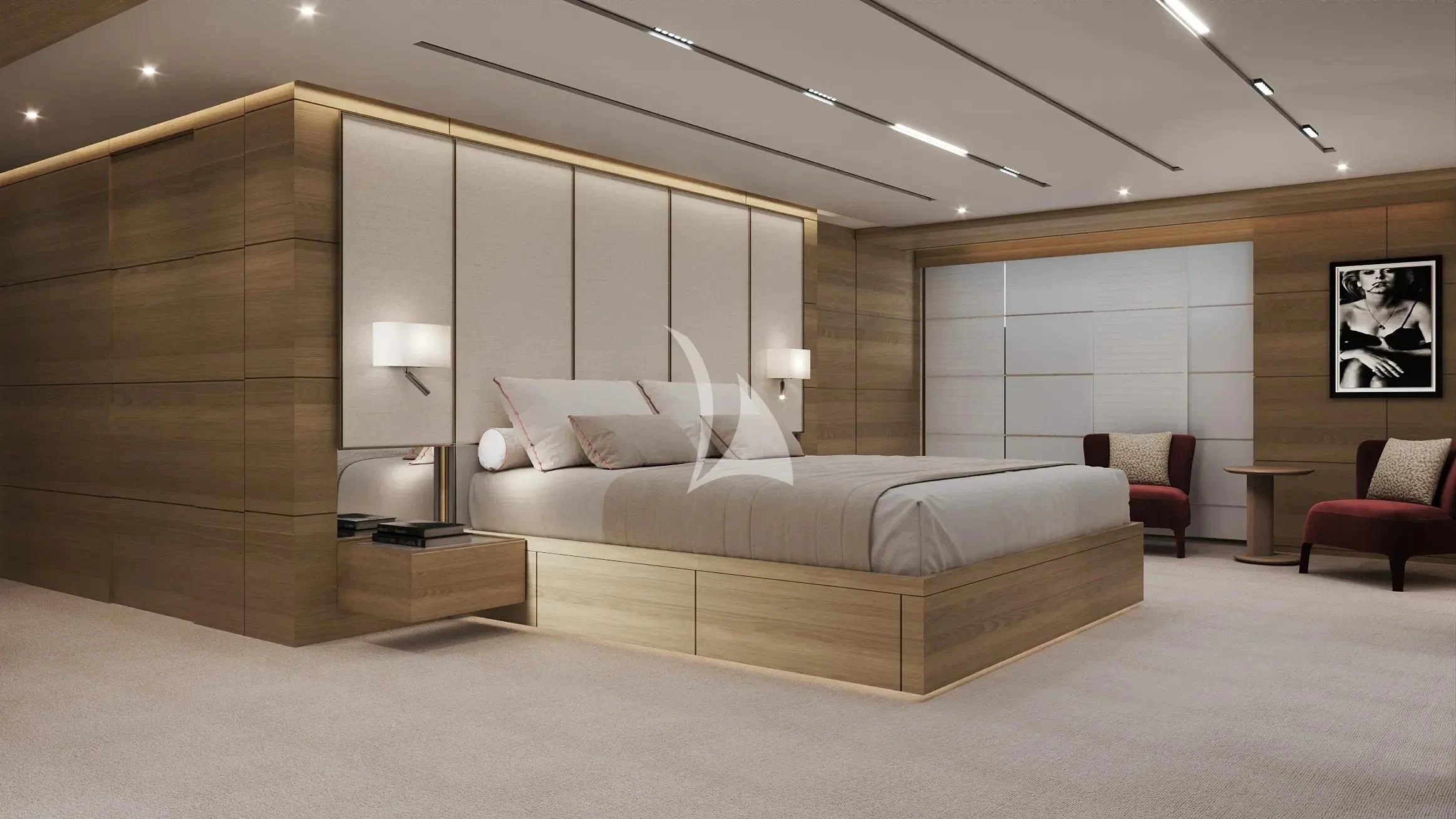 a large room with a bed and a chair aboard NAIA Yacht for Sale