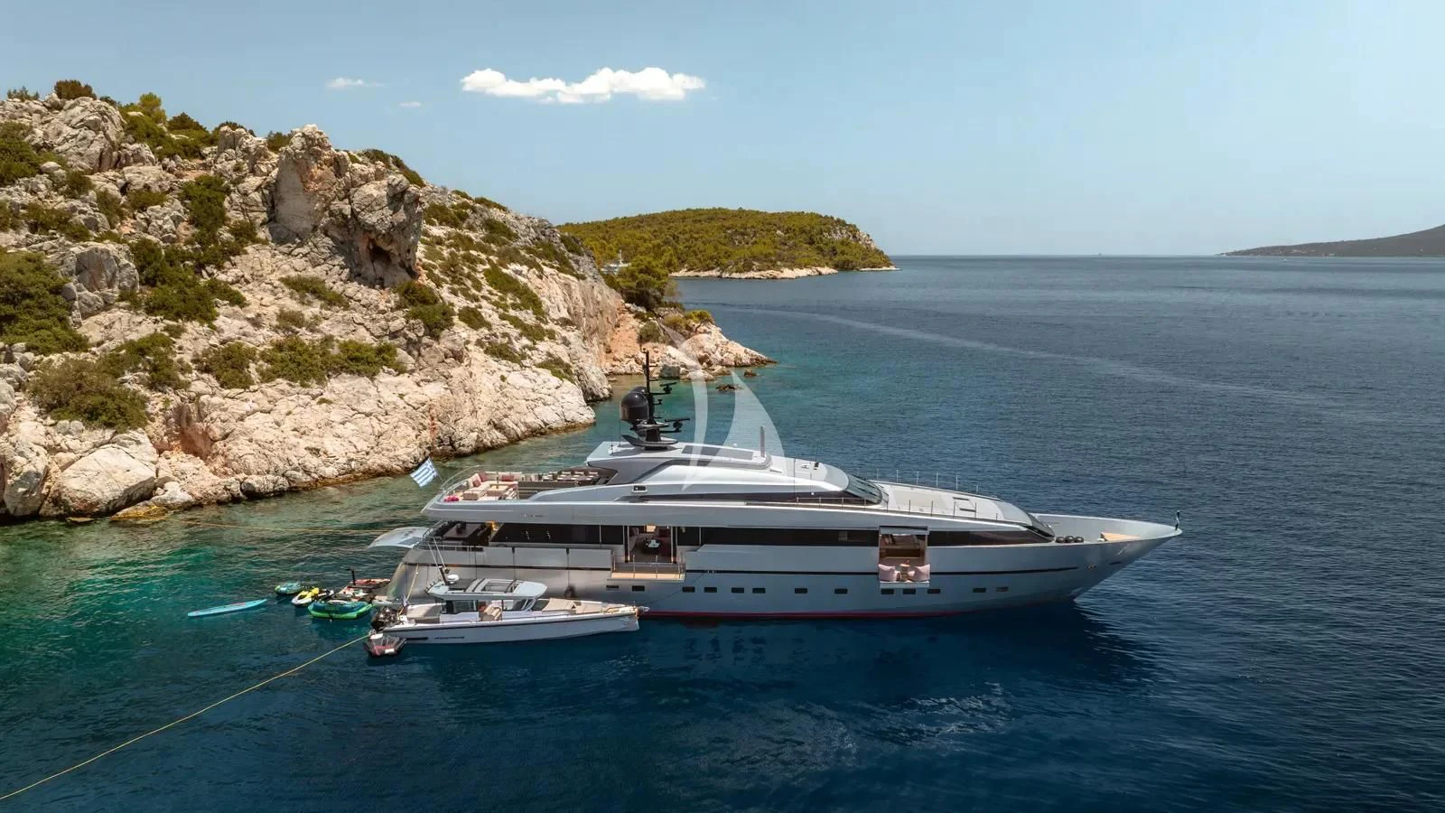 a boat sailing in the sea aboard NAIA Yacht for Sale