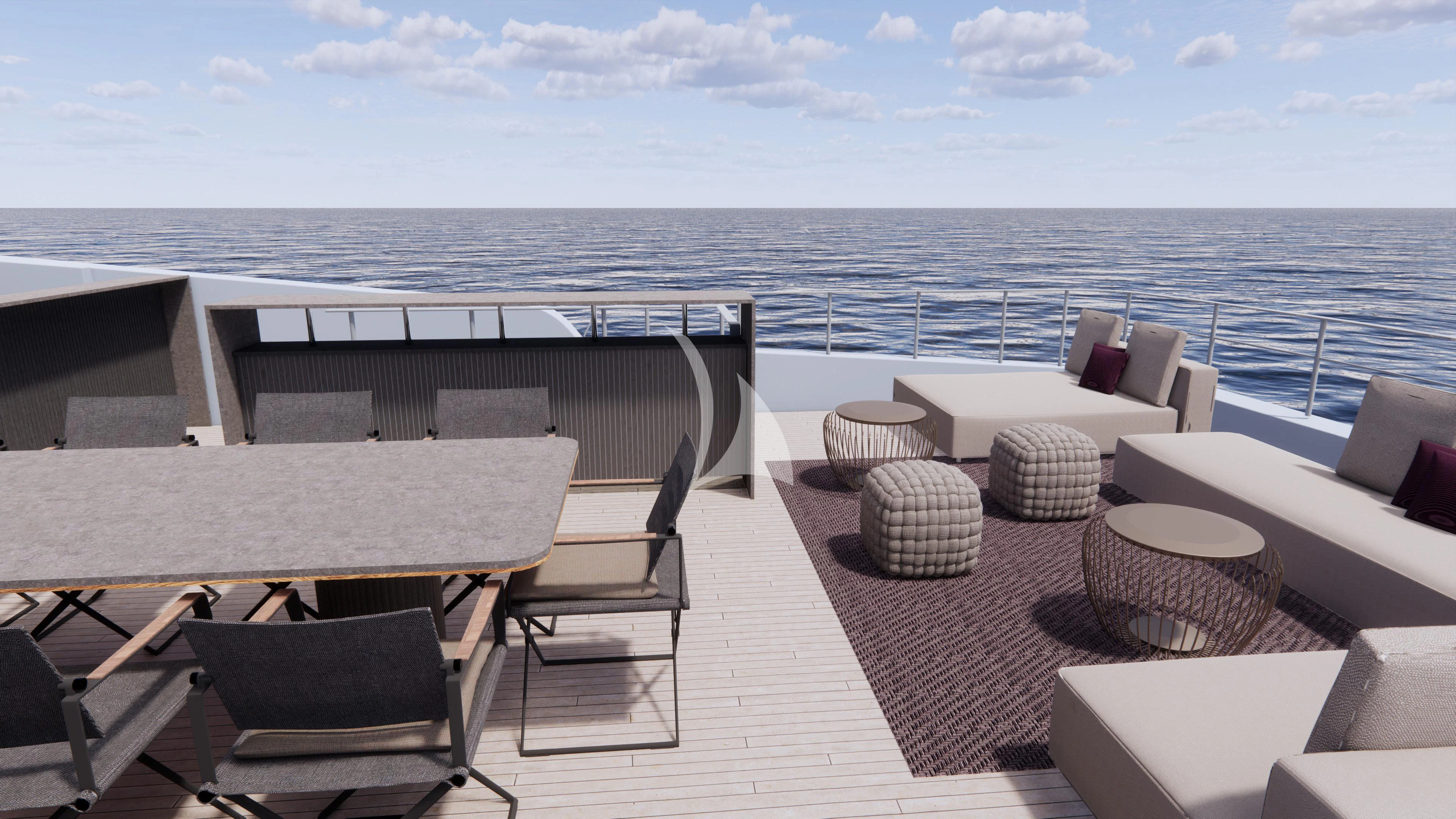 a deck with chairs and a large body of water in the background aboard NAIA Yacht for Sale