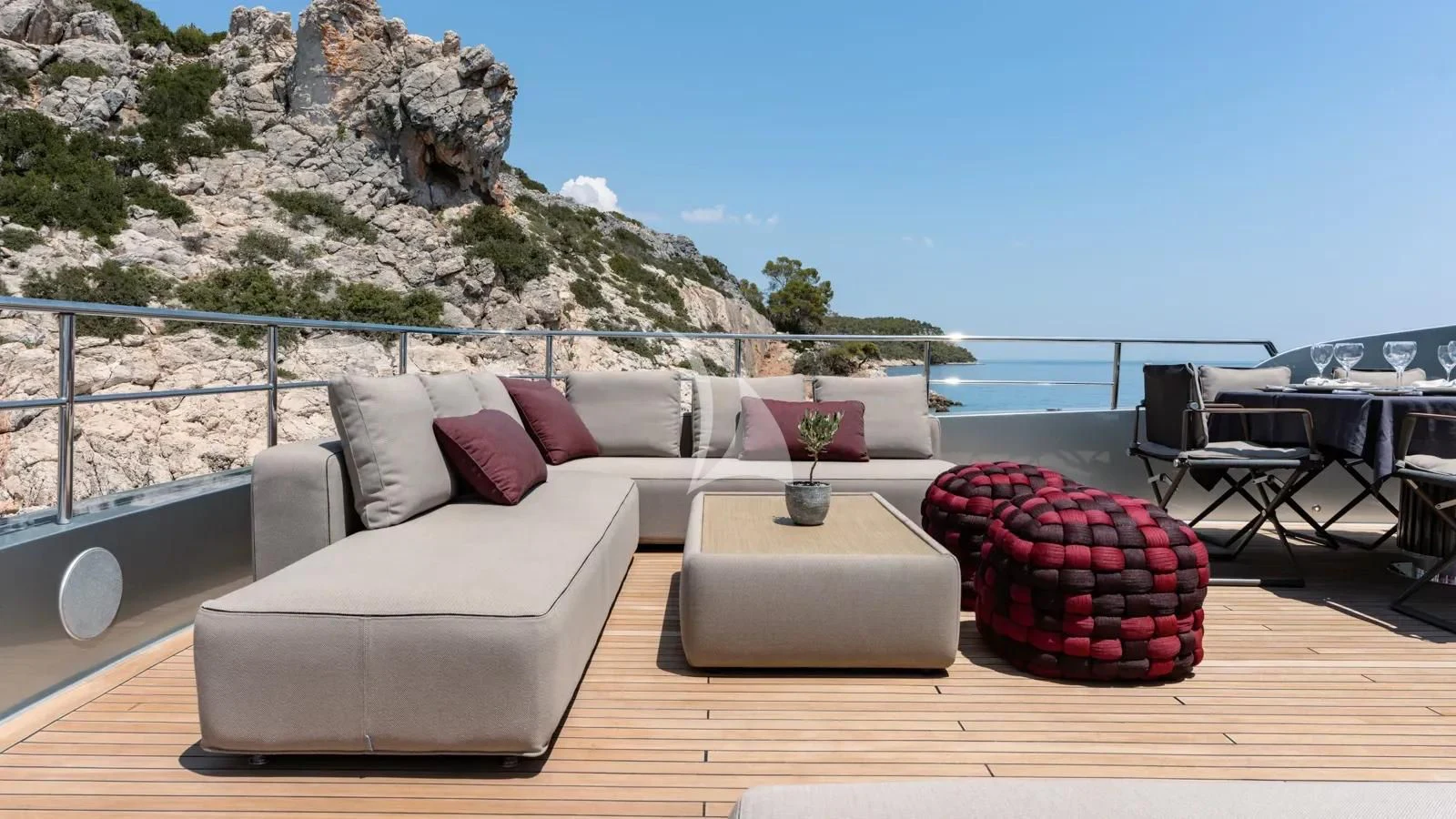 a living room with a large balcony aboard NAIA Yacht for Sale