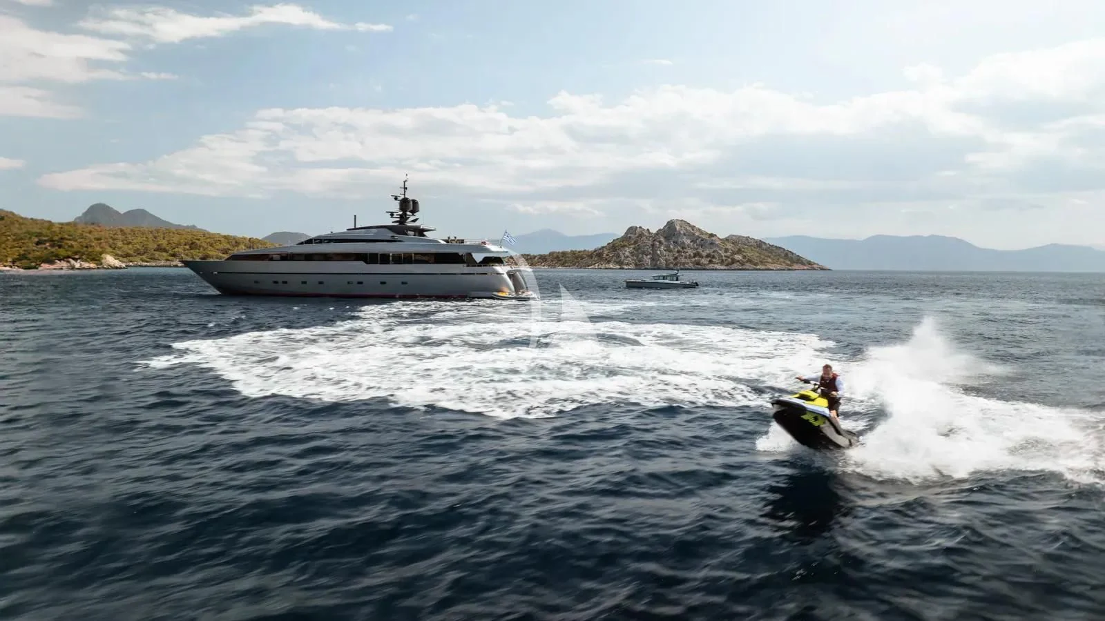 a boat and a boat in the water aboard NAIA Yacht for Sale