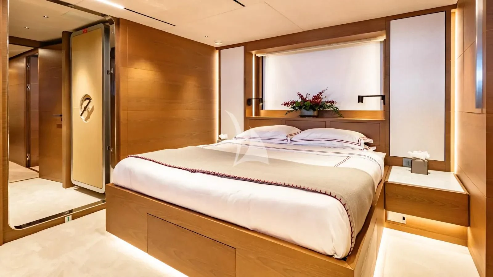 a bed in a room aboard NAIA Yacht for Sale