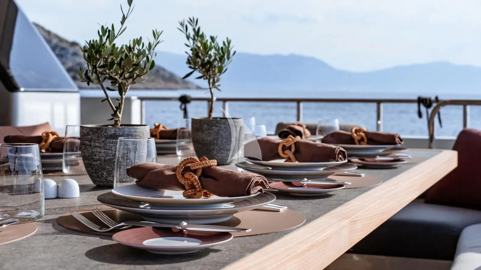 a table with food on it aboard NAIA Yacht for Sale