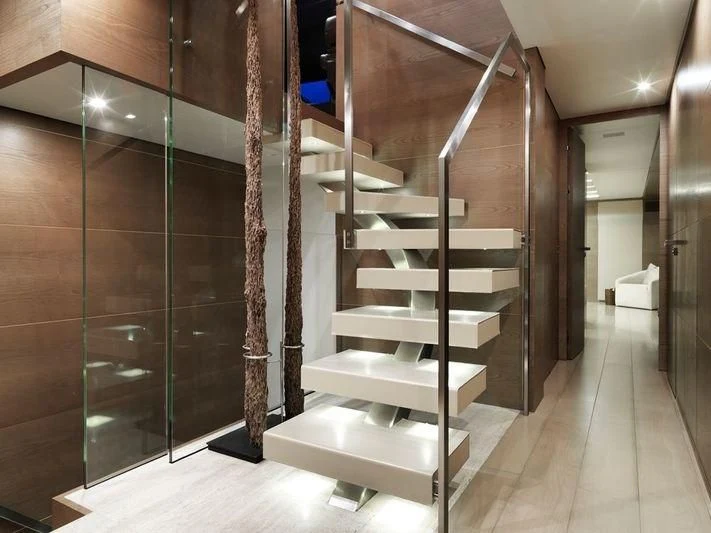 a staircase in a building aboard NAIA Yacht for Sale