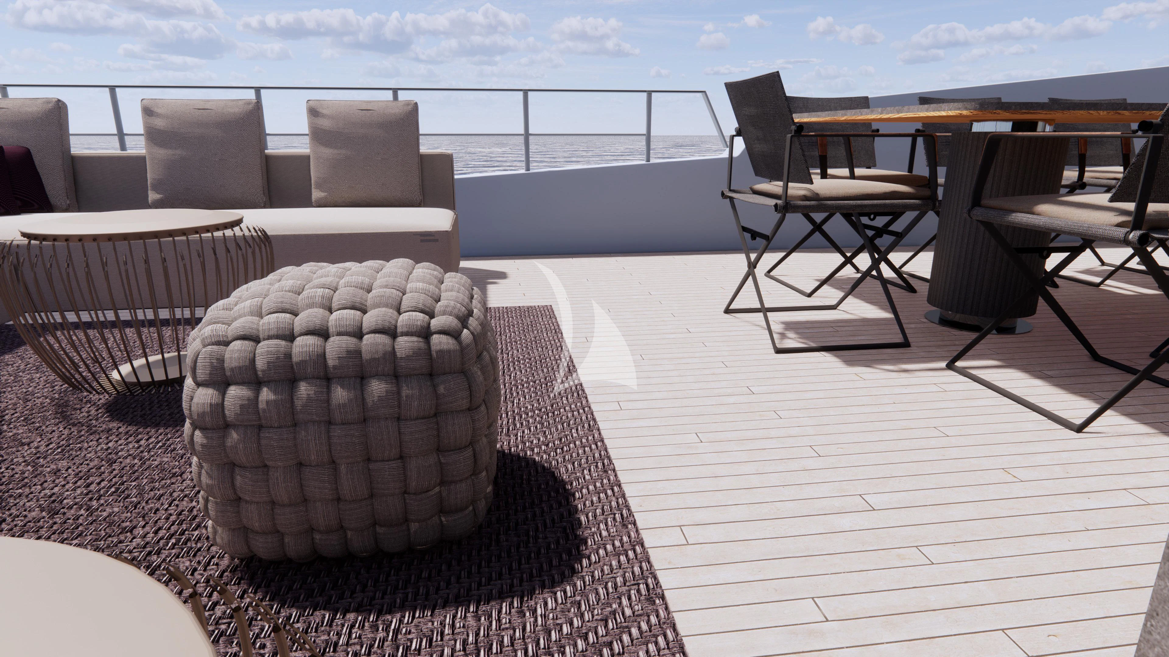 a patio with a table and chairs aboard NAIA Yacht for Sale