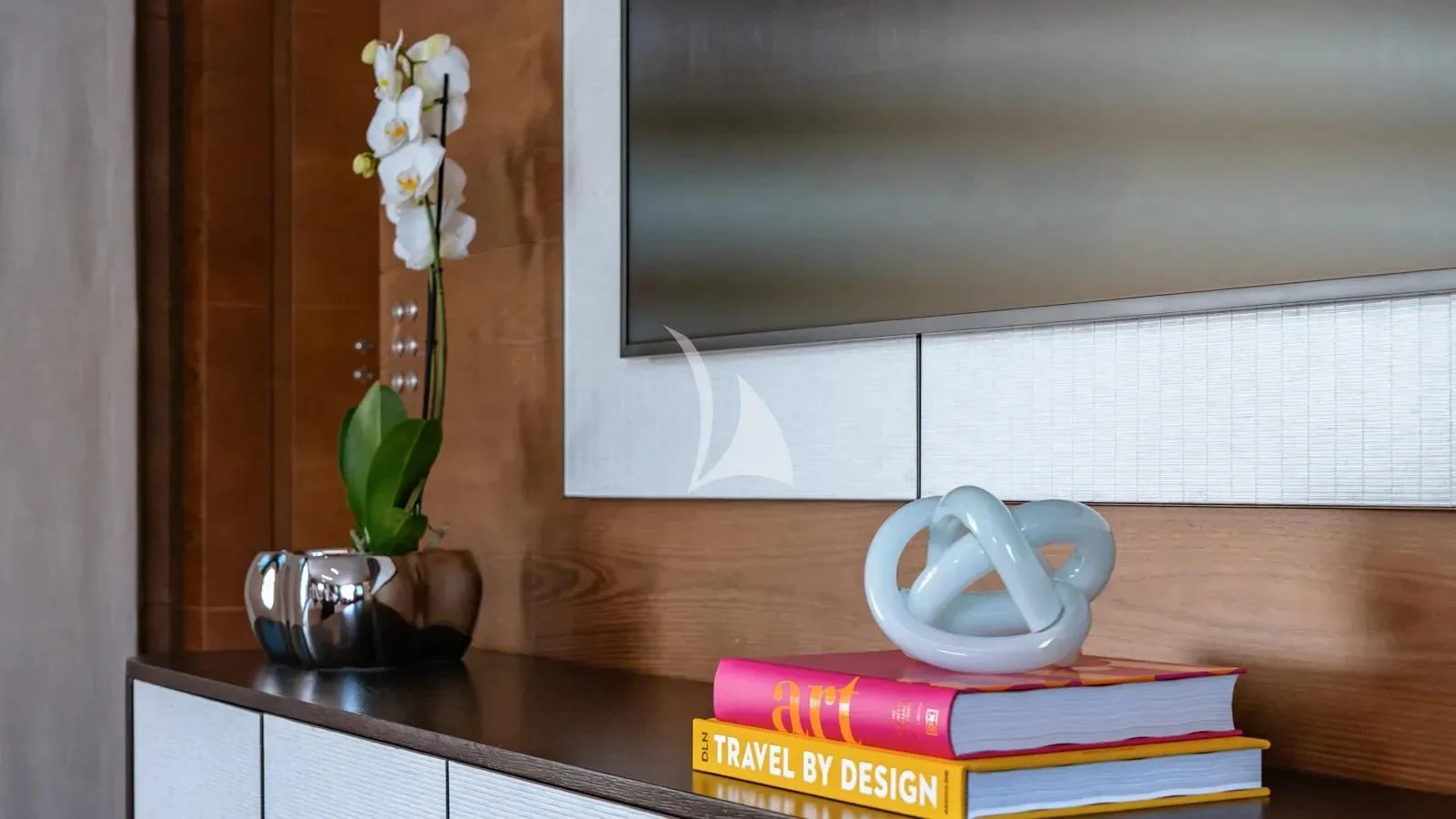 a vase of flowers on a shelf aboard NAIA Yacht for Sale