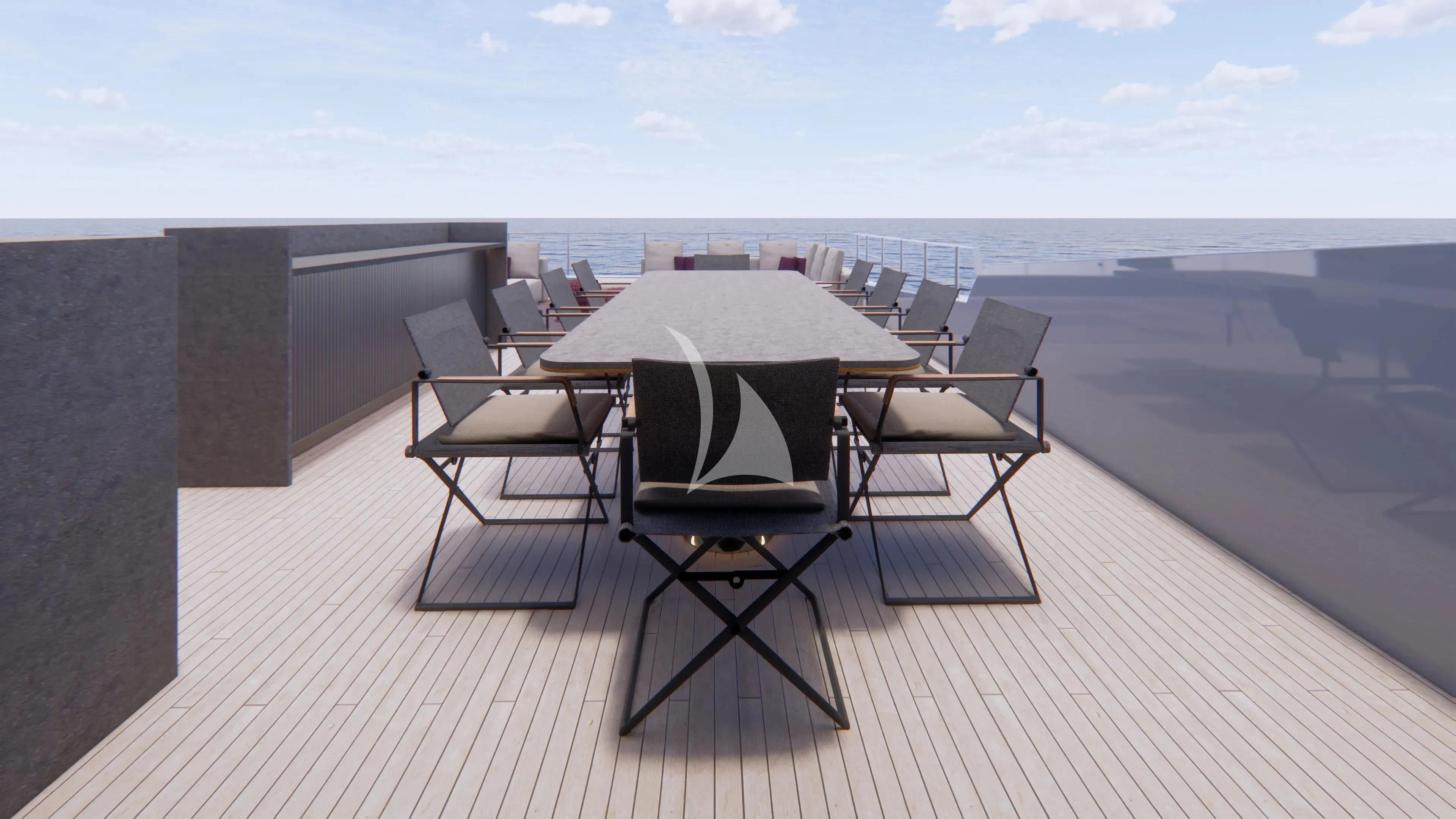 a table and chairs on a deck aboard NAIA Yacht for Sale