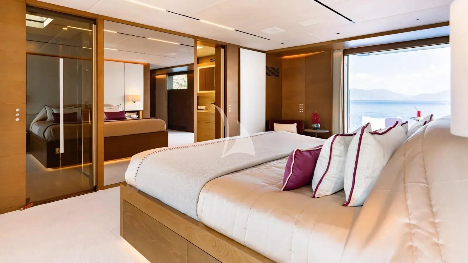 a bed in a room aboard NAIA Yacht for Sale