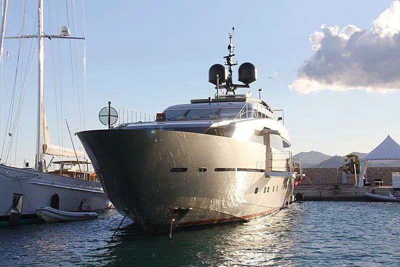 a large white boat sits in the water aboard NAIA Yacht for Sale