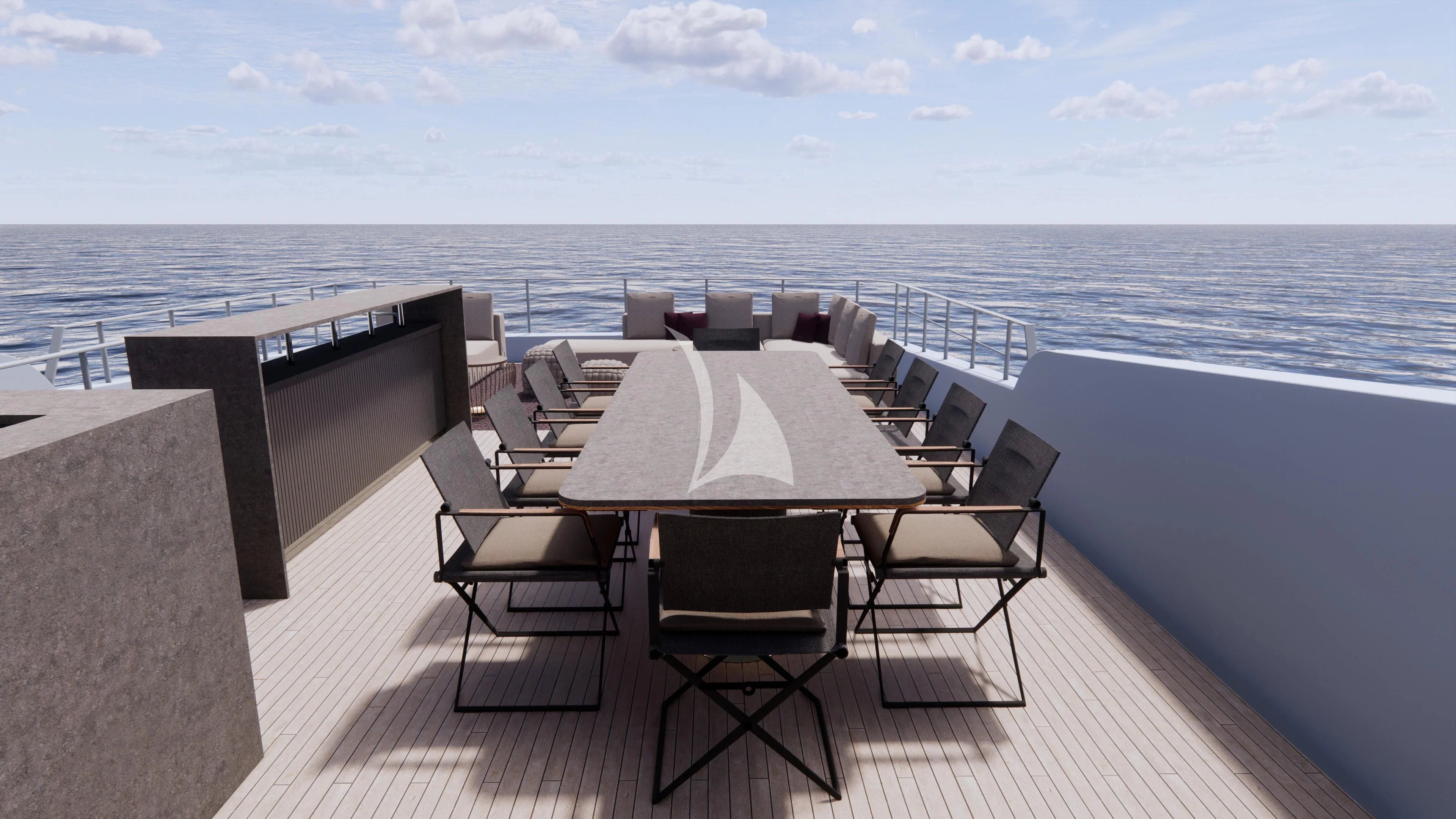 a table and chairs on a deck overlooking the ocean aboard NAIA Yacht for Sale