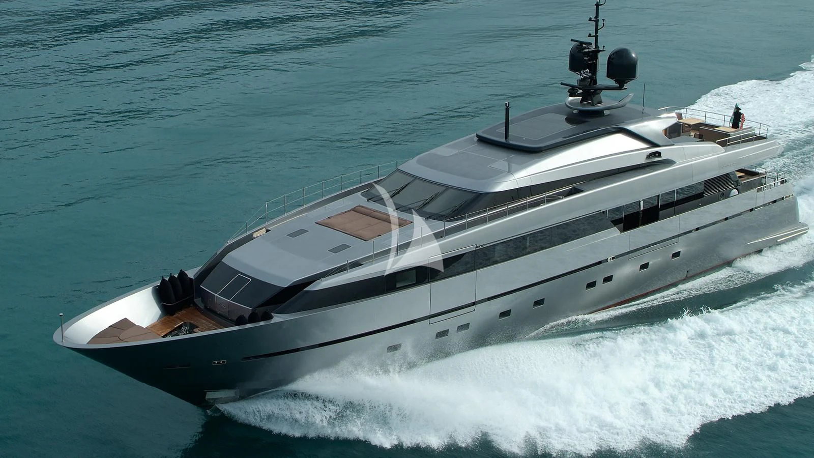 a white yacht on the water aboard NAIA Yacht for Sale