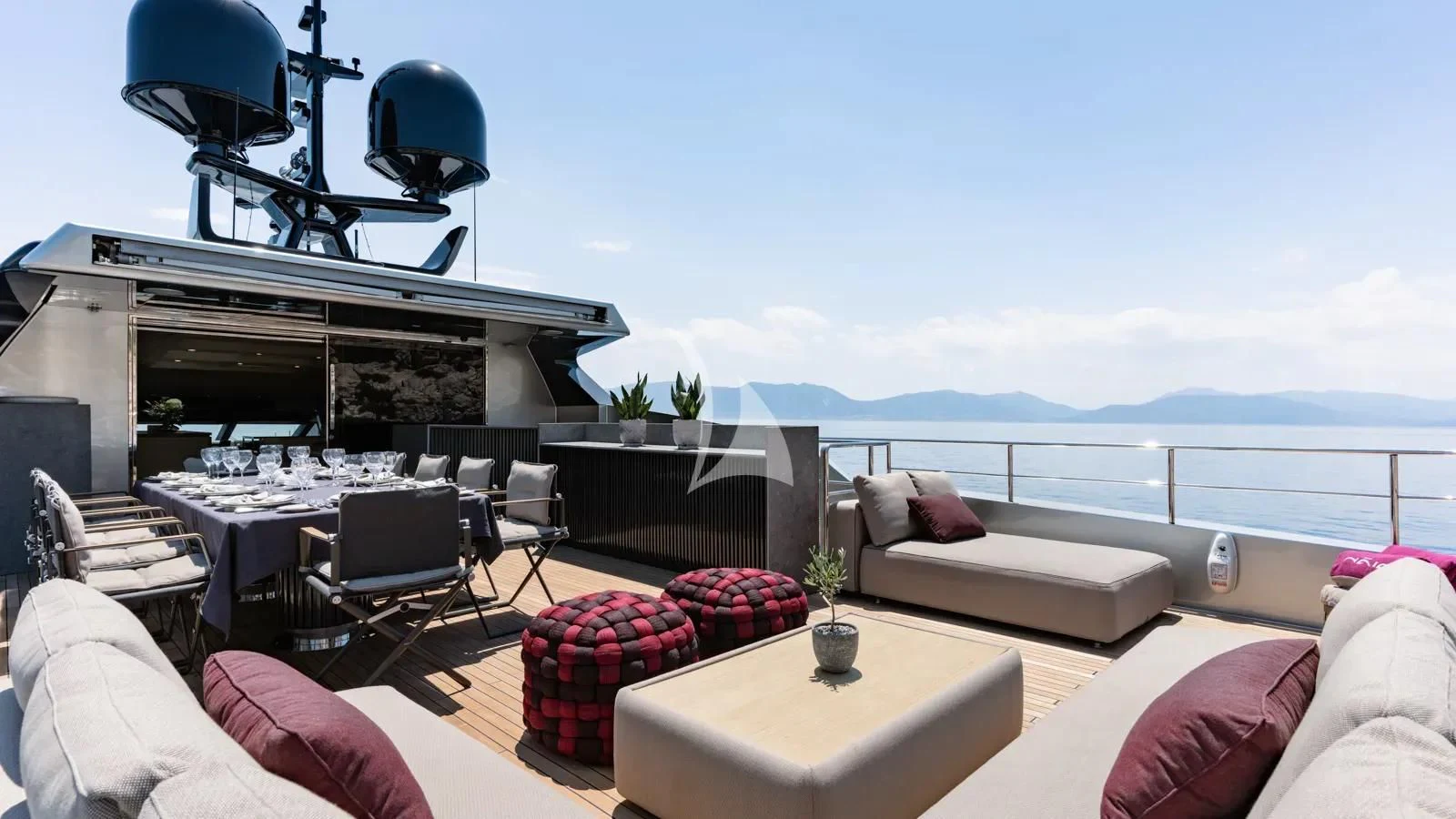 a living room with a large patio aboard NAIA Yacht for Sale