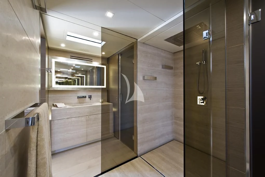 a bathroom with a shower unit aboard NAIA Yacht for Sale
