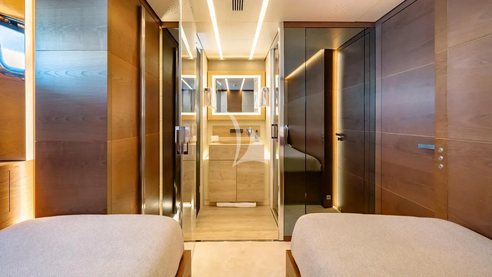 a room with a bed and a closet aboard NAIA Yacht for Sale