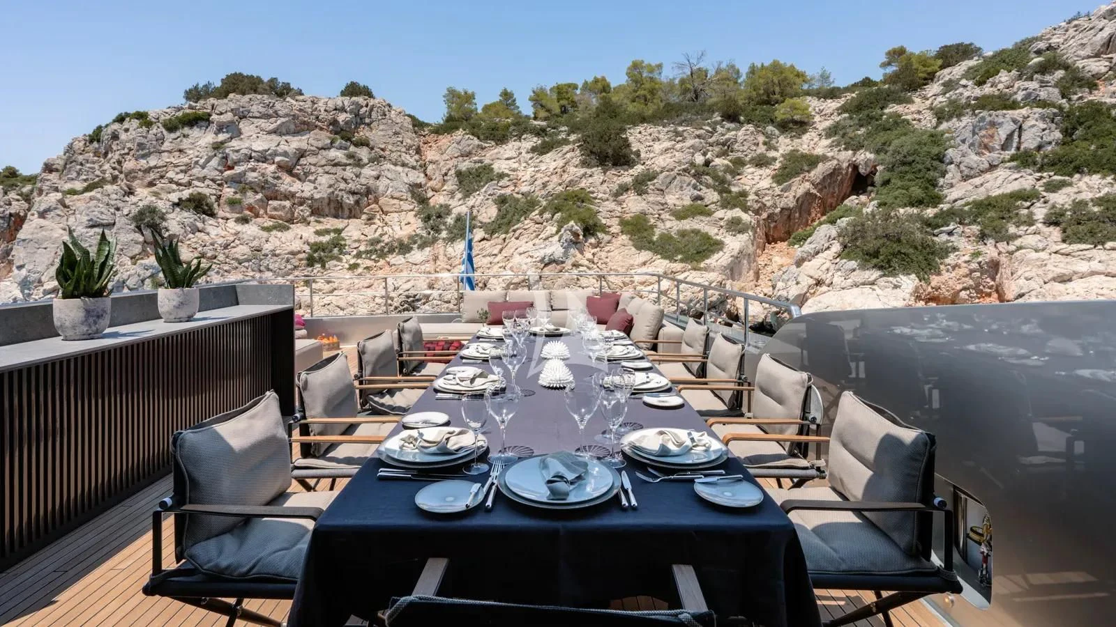 a table set for a meal aboard NAIA Yacht for Sale