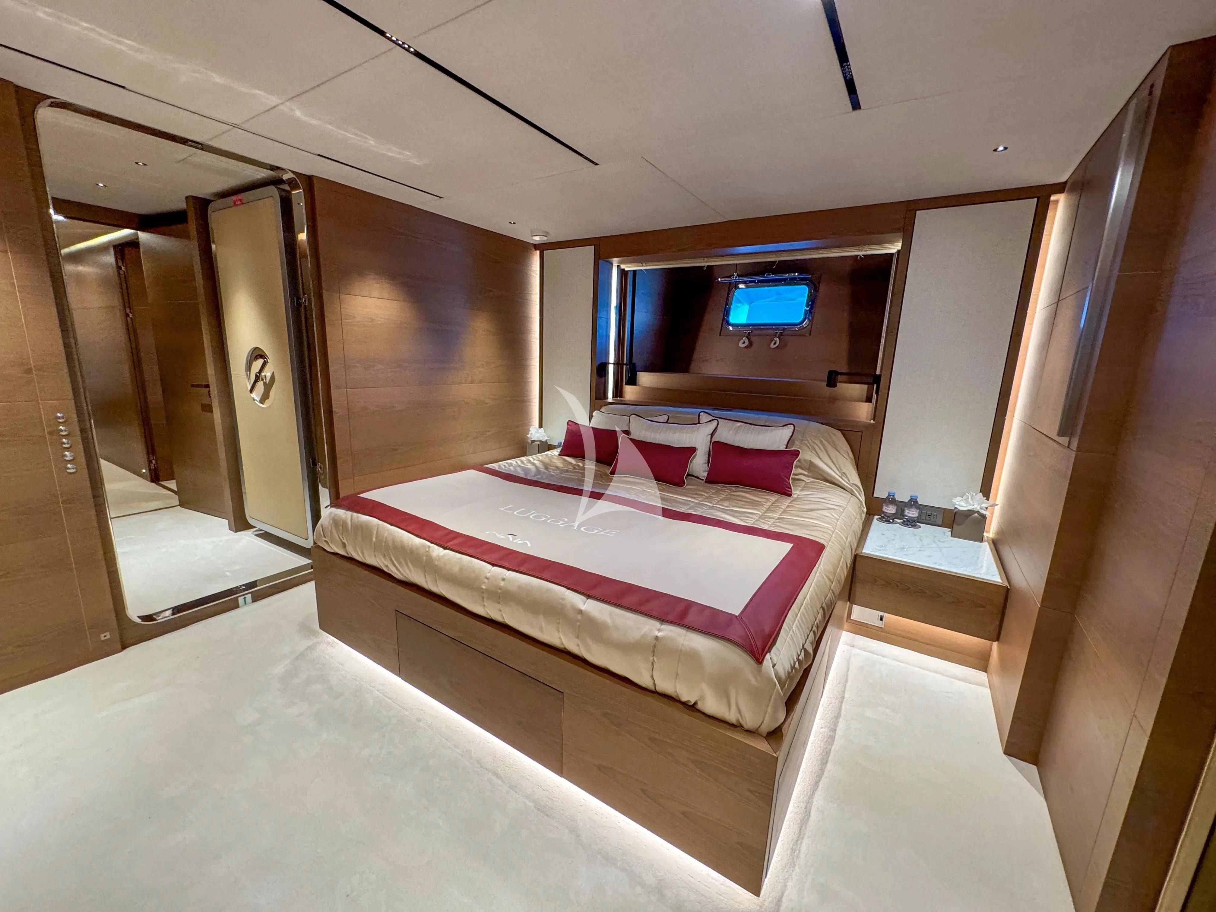 a bed in a room aboard NAIA Yacht for Sale