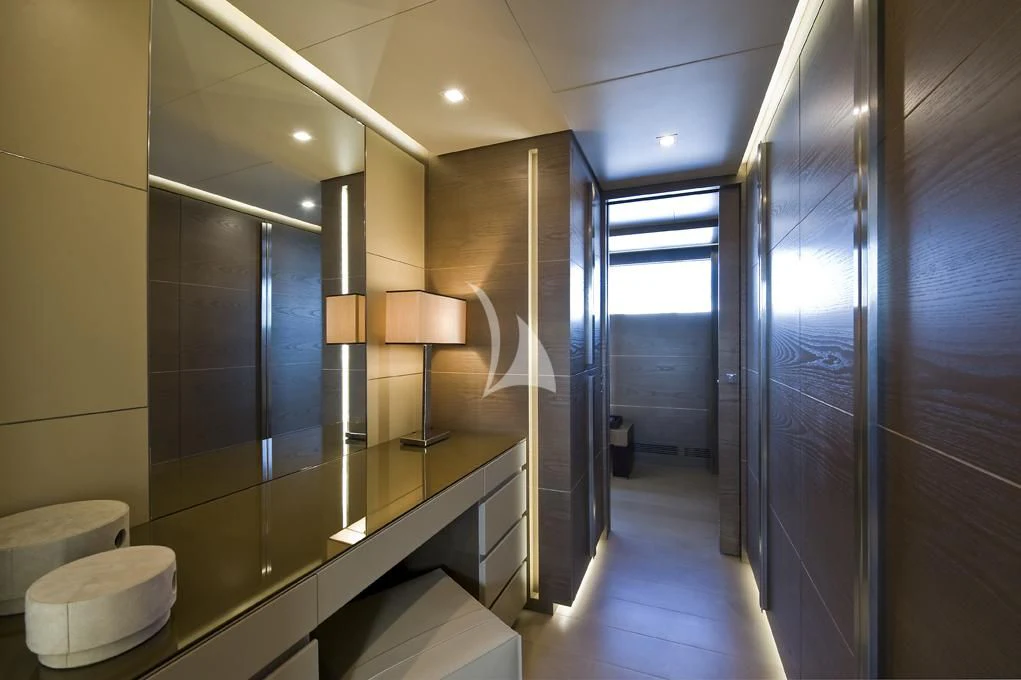 a bathroom with a glass shower aboard NAIA Yacht for Sale