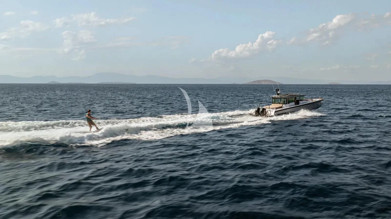 a boat is sailing in the sea aboard NAIA Yacht for Sale