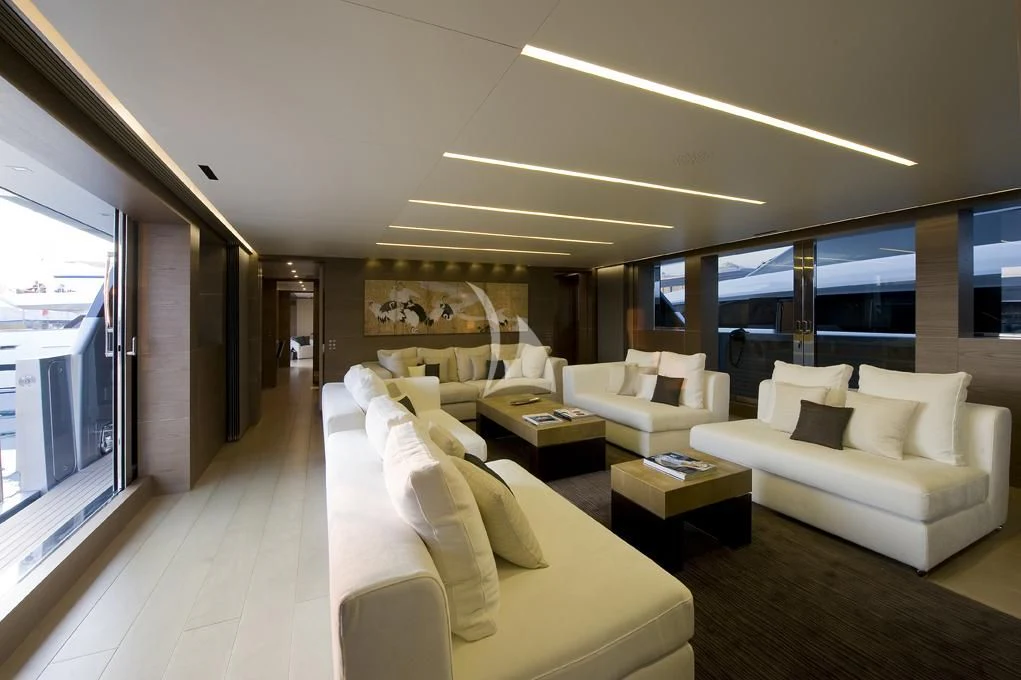 a living room with a large window aboard NAIA Yacht for Sale